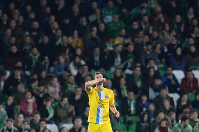 Espanyol's Brazilian forward Leo Baptistao celebrates afer scoring a goal during the Spanish Copa del Rey (King's Cup) quarter-final second leg football match between Real Betis and RCD Espanyol at the Benito Villamarin stadium in Sevilla on January 30, 2019. (Photo by CRISTINA QUICLER / AFP)Editoria: SPOLocal: SevilleIndexador: CRISTINA QUICLERSecao: soccerFonte: AFPFotógrafo: STR<!-- NICAID(14861304) -->