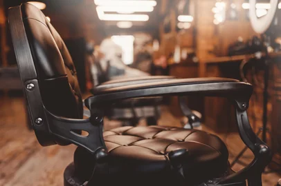 Barbershop armchair vintage color. Modern hairdresser and hair salon, barber shop for men.<!-- NICAID(15990204) -->