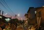 Montanhas de lixo e escassez de luz e água dificultam retomada no Sarandi 