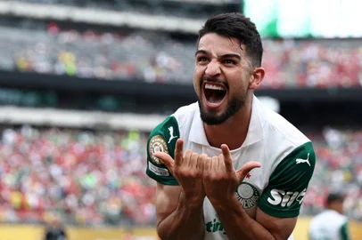Palmeiras' Argentine forward #42 Flaco Lopez celebrates scoring his team's second goal with teammates during the FIFA Club World Cup 2025 Group A football match between Brazil's Palmeiras and Egypt's Al-Ahly at the MetLife stadium in East Rutherford, New Jersey on June 19, 2025.