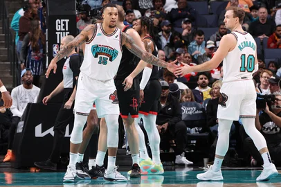 MEMPHIS, TN - JANUARY 30: Brandon Clarke #15 and Luke Kennard #10 of the Memphis Grizzlies high five during the game against the Houston Rockets on January 30, 2025 at FedExForum in Memphis, Tennessee. NOTE TO USER: User expressly acknowledges and agrees that, by downloading and or using this photograph, User is consenting to the terms and conditions of the Getty Images License Agreement. Mandatory Copyright Notice: Copyright 2025 NBAE   Joe Murphy/NBAE via Getty Images/AFP (Photo by JOE MURPHY / NBAE / Getty Images / Getty Images via AFP)<!-- NICAID(16283633) -->
