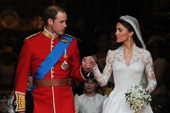 (FILES) In this file photo taken on April 29, 2011 Britain's Prince William and his wife Kate, Duchess of Cambridge, look at each other as they come out of Westminster Abbey following their wedding ceremony, in London. - Prince William and his wife Kate mark a decade of marriage on April 29, 2021, with the popular couple increasingly seen as the British monarchy's future as other senior royals age or recede from view. (Photo by CARL DE SOUZA / AFP)<!-- NICAID(14769477) -->