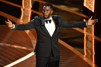 (FILES) US producer-musician Sean "Diddy" Combs speaks onstage during the 94th Oscars at the Dolby Theatre in Hollywood, California, on March 27, 2022. Combs will plead not guilty on September 17, 2024, to racketeering and sex trafficking charges, his lawyer said ahead of a court appearance by the superstar rapper. Combs, 54, was arrested on September 16 by federal agents acting on a sealed indictment filed by the US Attorney for the Southern District of New York. (Photo by Robyn Beck / AFP)Editoria: ACELocal: HollywoodIndexador: ROBYN BECKSecao: celebrityFonte: AFPFotógrafo: STF<!-- NICAID(15876681) -->