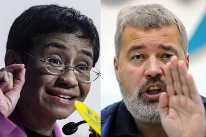 (COMBO) This file combination of pictures created on October 08, 2021, shows Maria Ressa (L), co-founder and CEO of the Philippines-based news website Rappler, speaking at the Human Rights Press Awards at the Foreign Correspondents Club of Hong Kong on on May 16, 2019 and Dmitry Muratov, editor-in-Chief of Russia's main opposition newspaper Novaya Gazeta gestures as he speaks during a news conference in Moscow, on December 11, 2012. - The Nobel Peace Prize goes to journalists Maria Ressa (Philippines) and Russian Dmitry Muratov, the Nobel Peace Prize committee announced on October 8, 2021 in Oslo. (Photo by Isaac LAWRENCE and Yuri KADOBNOV / AFP)<!-- NICAID(14909744) -->