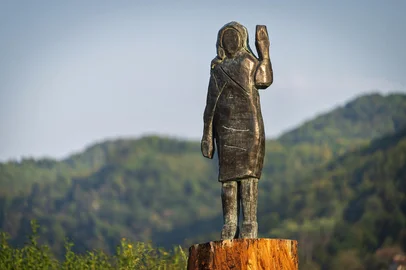 (FILES) A bronze replica depicting US First Lady Melania Trump, made by US artist Brad Downey, is seen after its unveiling in a field near US First Lady's hometown Sevnica, on September 15, 2020. Slovenian police are investigating the disappearance of a bronze statue of US First Lady Melania Trump, which was stolen near her Slovenian hometown, they said on May 15, 2025. The life-sized statue of her by American conceptual artist Brad Downey was unveiled near her hometown of Sevnica in 2020, towering on a tree stump over a field, after a previous statue, made of wood, was burnt down by unknown arsonists. But now it has disappeared -- cut above the ankles -- according to the artist and police. (Photo by Jure Makovec / AFP) / RESTRICTED TO EDITORIAL USE - MANDATORY MENTION OF THE ARTIST UPON PUBLICATION - TO ILLUSTRATE THE EVENT AS SPECIFIED IN THE CAPTION<!-- NICAID(16038295) -->