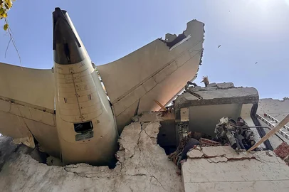 This handout taken and posted on the X (formerly Twitter)  of the Central Industrial Security Force (CISF) On June 12, 2025 shows the back of AN Air India plane after it crashed in a residential area near the airport in Ahmedabad. The London-bound Air India flight 171 enger plane crashed on June 12 in India's western city of Ahmedabad with 242 on board, aviation officials said in what the airline called a "tragic accident". (Photo by Handout / CENTRAL INDUSTRIAL SECURITY FORCE (CISF) / AFP) / -----EDITORS NOTE --- RESTRICTED TO EDITORIAL USE - MANDATORY CREDIT "AFP PHOTO / CENTRAL INDUSTRIAL SECURITY FORCE (CISF)  " - NO MARKETING - NO ADVERTISING CAMPAIGNS - DISTRIBUTED AS A SERVICE TO CLIENTS<!-- NICAID(16057932) -->