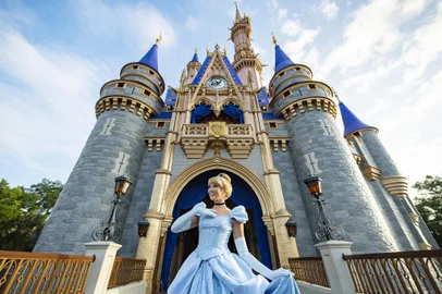 Cinderella poses in front of Cinderella Castle inside Magic Kingdom Park at Walt Disney World Resort in Lake Buena Vista, Fla. (Matt Stroshane, Photographer)<!-- NICAID(15908289) -->