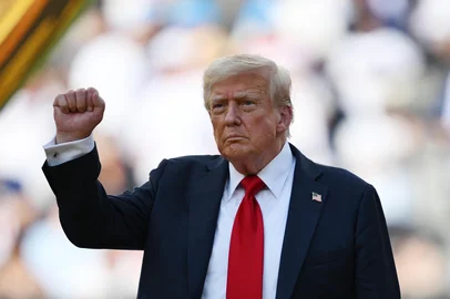 US President Donald Trump gestures during the award ceremony for the FIFA Club World Cup 2025 Champions, following the final football match between England's Chelsea and France's Paris Saint-Germain at the MetLife Stadium in East Rutherford, New Jersey on July 13, 2025. (Photo by ANGELA WEISS / AFP)<!-- NICAID(16082950) -->