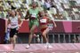 (From L) Belarus' Krystsina Tsimanouskaya, Nigeria's Blessing Okagbare, Spain's Maria Isabel Perez, Bahamas's Tynia Gaither and  Britain's Asha Philip compete in the women's 100m heats during the Tokyo 2020 Olympic Games at the Olympic Stadium in Tokyo on July 30, 2021. (Photo by Javier SORIANO / AFP)<!-- NICAID(14851150) -->