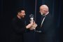 Argentina and Paris Saint-Germain forward Lionel Messi (L) receives from FIFA President Gianni Infantino the Best FIFA Mens Player award during the Best FIFA Football Awards 2022 ceremony in Paris on February 27, 2023. (Photo by FRANCK FIFE / AFP)Editoria: SPOLocal: ParisIndexador: FRANCK FIFESecao: soccerFonte: AFPFotógrafo: STF<!-- NICAID(15361379) -->