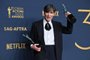 Irish actor Cillian Murphy poses in the press room with the awards for Outstanding Performance by a Male Actor in a Leading Role in a Motion Picture and Outstanding Performance by a Cast in a Motion Picture for "Oppenheimer" during the 30th Annual Screen Actors Guild awards at the Shrine Auditorium in Los Angeles, February 24, 2024. (Photo by Robyn BECK / AFP)<!-- NICAID(15689496) -->