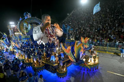 Revelers of the Beija-Flor samba school perform during the second night of Rio Carnival at the Marques de Sapucai Sambadrome in Rio de Janeiro, Brazil on March 4, 2025. (Photo by Mauro PIMENTEL / AFP)<!-- NICAID(15988340) -->