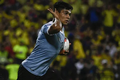 Uruguayan forward Matias Arezo celebrates after scoring against Argentina during their Under-23 South American Pre-Olympic Tournament football match at Alfonso Lopez stadium, Bucaramanga, Colombia on February 3, 2020. (Photo by Juan BARRETO / AFP)Editoria: SPOLocal: BucaramangaIndexador: JUAN BARRETOSecao: soccerFonte: AFPFotógrafo: STF<!-- NICAID(15810712) -->