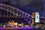 The Sydney Opera House and Sydney Harbour Bridge are illuminated with projections and lights at the start of the Vivid Sydney festival in Sydney on May 26, 2023. (Photo by DAVID GRAY / AFP)<!-- NICAID(15446369) -->