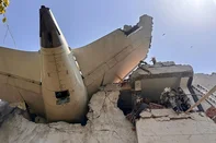 This handout taken and posted on the X (formerly Twitter) account of the Central Industrial Security Force (CISF) On June 12, 2025 shows the back of an Air India plane after it crashed in a residential area near the airport in Ahmedabad. The London-bound Air India flight 171 passenger plane crashed on June 12 in India's western city of Ahmedabad with 242 on board, aviation officials said in what the airline called a "tragic accident". (Photo by Handout / CENTRAL INDUSTRIAL SECURITY FORCE (CISF) / AFP) / -----EDITORS NOTE --- RESTRICTED TO EDITORIAL USE - MANDATORY CREDIT "AFP PHOTO / CENTRAL INDUSTRIAL SECURITY FORCE (CISF)  " - NO MARKETING - NO ADVERTISING CAMPAIGNS - DISTRIBUTED AS A SERVICE TO CLIENTSEditoria: DISLocal: AhmedabadIndexador: HANDOUTSecao: transport accidentFonte: CENTRAL INDUSTRIAL SECURITY FORCFotógrafo: Handout<!-- NICAID(16059372) -->