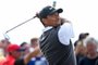 (FILES) In this file photo US golfer Tiger Woods watches his iron shot from the 16th tee during his third round on day 3 of The 147th Open golf Championship at Carnoustie, Scotland on July 21, 2018. - Tiger Woods was hospitalized following a bad single-car accident in Los Angeles County on the morning of February 23, 2021, with officials requiring the jaws of life to free him from the vehicle. "On February 23, 2021, at approximately 7:12 am,  LASD responded to a single vehicle roll-over traffic collision on the border of Rolling Hills Estates and Rancho Palos Verdes," officials say. (Photo by Andy BUCHANAN / AFP)Editoria: SPOLocal: CarnoustieIndexador: ANDY BUCHANANSecao: golfFonte: AFPFotógrafo: STR<!-- NICAID(14720829) -->