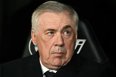 Real Madrid's Italian coach Carlo Ancelotti looks on prior the Spanish Copa del Rey (King's Cup) last 16 first leg football match between Real Madrid CF and RC Celta de Vigo at the Santiago Bernabeu stadium in Madrid on January 16, 2025. (Photo by JAVIER SORIANO / AFP)<!-- NICAID(15956400) -->