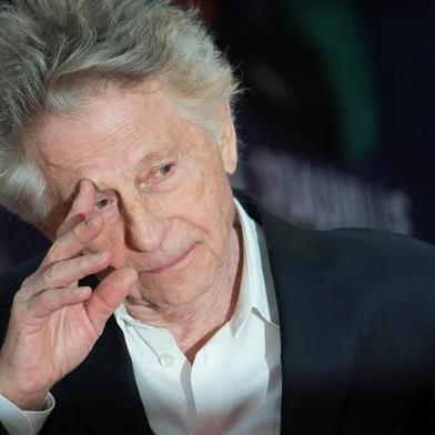 (FILES) French-Polish director and former president of the Jury, Roman Polanski, arrives on the red carpet of the 45th Deauville US Film Festival, on September 7, 2019 in Deauville, northern France. French-Polish director Roman Polanski, who fled the United States decades ago after admitting to the statutory rape of a 13-year-old, will no longer face trial over an alleged assault of another minor after reaching a settlement, his lawyer said on October 22, 2024. (Photo by LOIC VENANCE / AFP)Editoria: ACELocal: DeauvilleIndexador: LOIC VENANCESecao: cinemaFonte: AFPFotógrafo: STF<!-- NICAID(15896937) -->