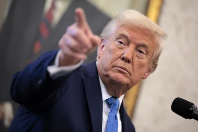 WASHINGTON, DC - APRIL 22: U.S. President Donald Trump delivers remarks during the swearing-in ceremony for Securities and Exchange Commission Chairman Paul Atkins in the Oval Office at the White House on April 22, 2025 in Washington, DC. Having previously served as a commissioner at the SEC under President George W. Bush, Atkins is free-market, pro-business conservative and is expected to take a lighter regulatory touch on crypto and other digital assets.   Chip Somodevilla/Getty Images/AFP (Photo by CHIP SOMODEVILLA / GETTY IMAGES NORTH AMERICA / Getty Images via AFP)<!-- NICAID(16022120) -->