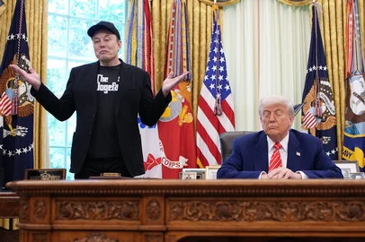 WASHINGTON, DC - MAY 30: Tesla CEO Elon Musk speaks alongside U.S. President Donald Trump to reporters in the Oval Office of the White House on May 30, 2025 in Washington, DC. Musk, who served as an adviser to Trump and led the Department of Government Efficiency, announced he would leave his role in the Trump istration to refocus on his businesses.   Kevin Dietsch/Getty Images/AFP (Photo by Kevin Dietsch / GETTY IMAGES NORTH AMERICA / Getty Images via AFP)<!-- NICAID(16049363) -->
