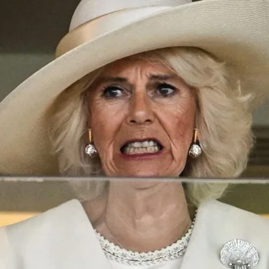 Britain's Queen Camilla reacts during the second race on the first day of the Royal Ascot horse racing meeting, in Ascot, west of London, on June 20, 203. (Photo by JUSTIN TALLIS / AFP)<!-- NICAID(15464422) -->