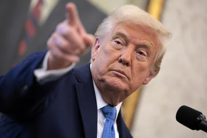 WASHINGTON, DC - APRIL 22: U.S. President Donald Trump delivers remarks during the swearing-in ceremony for Securities and Exchange Commission Chairman Paul Atkins in the Oval Office at the White House on April 22, 2025 in Washington, DC. Having previously served as a commissioner at the SEC under President George W. Bush, Atkins is free-market, pro-business conservative and is expected to take a lighter regulatory touch on crypto and other digital assets.   Chip Somodevilla/Getty Images/AFP (Photo by CHIP SOMODEVILLA / GETTY IMAGES NORTH AMERICA / Getty Images via AFP)<!-- NICAID(16022120) -->
