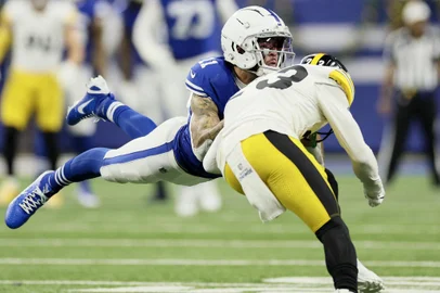 INDIANAPOLIS, INDIANA - DECEMBER 16: Michael Pittman Jr. #11 of the Indianapolis Colts and Damontae Kazee #23 of the Pittsburgh Steelers collide while going after a ball during the second quarter at Lucas Oil Stadium on December 16, 2023 in Indianapolis, Indiana.   Andy Lyons/Getty Images/AFP (Photo by ANDY LYONS / GETTY IMAGES NORTH AMERICA / Getty Images via AFP)<!-- NICAID(15630054) -->