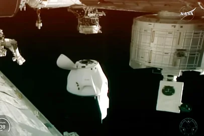 This screengrab taken from NASA+ livestream shows the SpaceX Crew Dragon Endeavour spacecraft carrying NASA astronauts Mike Fincke and Zena Cardman, Japan Aerospace Exploration Agency (JAXA) astronaut Kimiya Yui, and Roscosmos cosmonaut Oleg Platonov, undocking from the International Space Station (ISS) on January 14, 2026. Four crewmembers departed the International Space Station on January 14 after a medical issue prompted their mission to be cut a month short -- a first for the orbiting laboratory.The US space agency has declined to disclose which crewmember has the health problem or give details about the issue, but it has stressed the return is not an emergency situation.The affected crewmember "was and continues to be in stable condition," NASA official Rob Navias said on January 14. (Photo by NASA / AFP) / RESTRICTED TO EDITORIAL USE - MANDATORY CREDIT "AFP PHOTO /  NASA / NASA+ LIVESTREAM " - NO MARKETING NO ADVERTISING CAMPAIGNS - DISTRIBUTED AS A SERVICE TO CLIENTS<!-- NICAID(16204510) -->