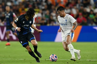Pachuca's Mexican defender #03 Alonso Aceves and Al Hilal's Brazilian forward #11 Marcos Leonardo fight for the ball during the FIFA Club World Cup 2025 Group H football match between Saudi's Al-Hilal and Mexico's Pachuca at the Geodis Park stadium in Nashville on June 26, 2025. (Photo by Federico PARRA / AFP)<!-- NICAID(16068579) -->