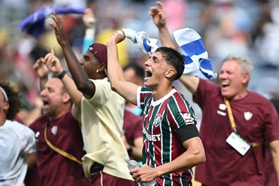 Fluminense's Uruguayan midfielder #05 Facundo Bernal celebrates after winning the FIFA Club World Cup 2025 quarterfinal football match between Brazil's Fluminense and Saudi Arabia's Al-Hilal at the Camping World Stadium in Orlando on July 4, 2025. (Photo by Paul ELLIS / AFP)<!-- NICAID(16073802) -->