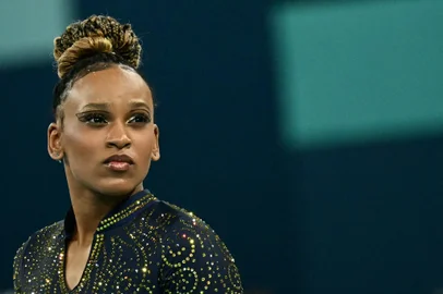 Brazil's Rebeca Andrade looks on during the artistic gymnastics women's team final during the Paris 2024 Olympic Games at the Bercy Arena in Paris, on July 30, 2024. (Photo by Loic VENANCE / AFP)<!-- NICAID(15829973) -->