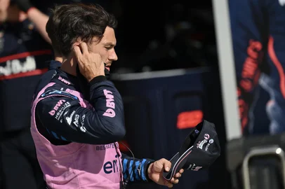 Alpine's French driver Pierre Gasly looks on in the pit during the qualifying session ahead of the Italian Formula One Grand Prix at the Autodromo Nazionale Monza circuit, in Monza, northern Italy, on September 6, 2025. (Photo by Marco BERTORELLO / POOL / AFP)<!-- NICAID(16118631) -->