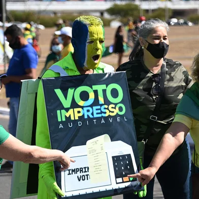 Demonstrators take part in a rally in support of Brazilian President Jair Bolsonaro and calling for a printed vote model at Esplanade of Ministries in Brasilia, Brazil on August 1, 2021. (Photo by EVARISTO SA / AFP)<!-- NICAID(14850714) -->