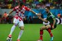 491922461Croatia's midfielder Ivan Perisic (L) and Mexico's defender Miguel Layun vie for the ball during a Group A football match between Croatia and Mexico at the Pernambuco Arena in Recife during the 2014 FIFA World Cup on June 23, 2014.      AFP PHOTO / YURI CORTEZEditoria: SPOLocal: RecifeIndexador: YURI CORTEZSecao: SoccerFonte: AFPFotógrafo: STF