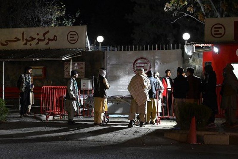 Relatives of blast victims gather outside the Italian aid organisation 'Emergency' hospital in Kabul on November 7, 2023, following an explosion on a bus. Seven people died and 20 others were injured in a bus explosion in the Afghan capital on November 7, police said.