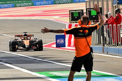 McLaren's Australian driver Oscar Piastri drives on the first day of the Formula One pre-season testing at the Bahrain International Circuit in Sakhir on February 11, 2026. (Photo by Giuseppe CACACE / AFP)<!-- NICAID(16222967) -->