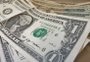 Por que a queda do dólar não faz nem cócegas na inflação