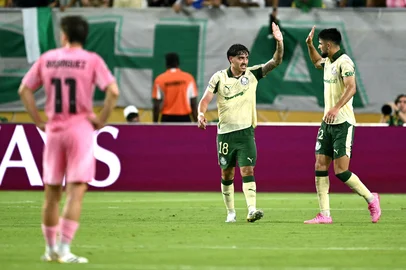 Palmeiras' Brazilian midfielder #18 Mauricio celebrates scoring his team's second goal with Palmeiras' Argentine forward #42 Jose Manuel Lopez (R) during the FIFA Club World Cup 2025 Group A football match between US Inter Miami and Brazil's Palmeiras at the Hard Rock stadium in Miami on June 23, 2025. (Photo by PATRICIA DE MELO MOREIRA / AFP)<!-- NICAID(16065938) -->