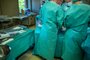 *A PEDIDO DE NIKOLAS MANDADORI* a surgical team performs a surgical abdominal operationIndexador: Karsten EggertFonte: 346705911<!-- NICAID(15121170) -->