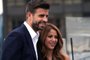 (FILES) This file photo taken on September 5, 2019 shows Colombian musician Shakira and partner Kosmoa Founder and President, Spanish football player Gerard Pique attending the Davis Cup Presentation in New York. - Colombian superstar Shakira and FC Barcelona defender Gerard Pique said on June 4, 2022  they were calling time on their relationship of more than a decade. The couple share two children. (Photo by Bryan R. Smith / AFP)Editoria: SPOLocal: New YorkIndexador: BRYAN R. SMITHSecao: tennisFonte: AFPFotógrafo: STR<!-- NICAID(15115490) -->