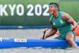 Brazil's Isaquias Queiroz dos Santos celebrates after winning the gold medal in the men's canoe single 1000m final during the Tokyo 2020 Olympic Games at Sea Forest Waterway in Tokyo on August 7, 2021. (Photo by Luis ACOSTA / AFP)<!-- NICAID(14856971) -->