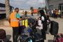 Civilians leaving Gaza wait to board a bus as dual national Palestinians and foreigners prepare to cross the Rafah border point with Egypt, in the southern Gaza Strip, on November 2, 2023. Egypt will help evacuate "about 7,000" foreigners and dual nationals from the war-ravaged Gaza Strip, the foreign ministry said, with officials saying some 400 people were expected to cross on November 2. (Photo by Mohammed ABED / AFP)<!-- NICAID(15586562) -->