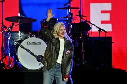 (FILES) US singer Lady Gaga waves before performing during a campaign rally by US Vice President and Democratic presidential candidate Kamala Harris speaks the Benjamin Franklin Parkway in Philadelphia, Pennsylvania on November 4, 2024. Lady Gaga will give a free mega-concert on Rio de Janeiro's iconic Copacabana beach on May 3, 2025, one year after Madonna revolutionized the city in her wake. (Photo by ANGELA WEISS / AFP)<!-- NICAID(15979025) -->