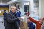 This handout picture released by the Argentinian Presidency shows Argentine President Alberto Fernandez (L) casting his vote during primary elections at a polling station in Buenos Aires on August 13, 2023. (Photo by Esteban Collazo / Argentinian Presidency / AFP) / RESTRICTED TO EDITORIAL USE - MANDATORY CREDIT "AFP PHOTO / ARGENTINIAN PRESIDENCY / ESTEBAN COLLAZO" - NO MARKETING NO ADVERTISING CAMPAIGNS - DISTRIBUTED AS A SERVICE TO CLIENTSEditoria: POLLocal: Buenos AiresIndexador: ESTEBAN COLLAZOSecao: political candidatesFonte: Argentinian PresidencyFotógrafo: Handout<!-- NICAID(15509086) -->