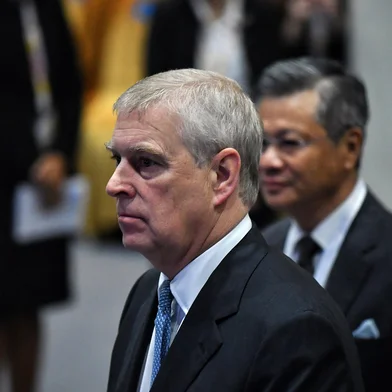(FILES) In this file photo taken on November 03, 2019 Britain's Prince Andrew, Duke of York (L) arrives for the ASEAN Business and Investment Summit in Bangkok on the sidelines of the 35th Association of Southeast Asian Nations (ASEAN) Summit. - Britain's Prince Andrew was sued in a New York court on August 9, 2021 for alleged sexual abuse of a woman who says she was "lent out" for underage sex by late US financier Jeffrey Epstein. (Photo by Lillian SUWANRUMPHA / AFP)<!-- NICAID(14858604) -->