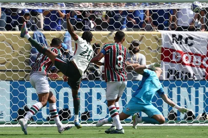 Chelsea's Brazilian forward #20 Joao Pedro (2-L) scores his team's second goal during the FIFA Club World Cup 2025 semifinal football match between Brazil's Fluminense and England's Chelsea at the MetLife stadium in East Rutherford, New Jersey on July 8, 2025. (Photo by FRANCK FIFE / AFP)<!-- NICAID(16076035) -->