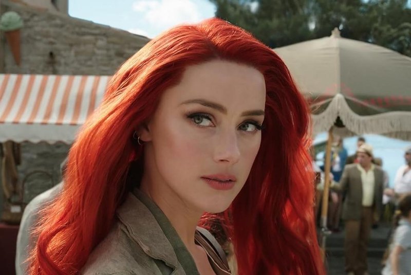 Amber Heard como Mera em Aquaman (2018), da DC. Elon Musk teria interferido para manter a atriz na franquia.<!-- NICAID(15566064) -->