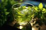 Fresh green tea with mint leafFonte: 651839549<!-- NICAID(15619998) -->