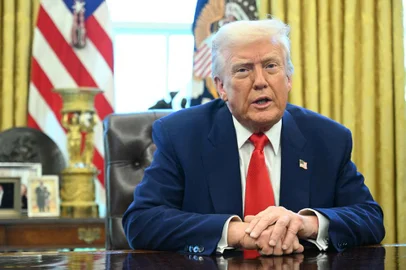 US President Donald Trump speaks before signing an executive order in the Oval Office of the White House on April 9, 2025 in Washington, DC. (Photo by SAUL LOEB / AFP)<!-- NICAID(16013616) -->