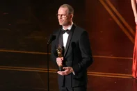 HOLLYWOOD, CALIFORNIA - MARCH 15: Joachim Trier accepts the International Feature Film award for "Sentimental Value" onstage during the 98th Oscars at Dolby Theatre on March 15, 2026 in Hollywood, California.   Kevin Winter/Getty Images/AFP (Photo by KEVIN WINTER / GETTY IMAGES NORTH AMERICA / Getty Images via AFP)<!-- NICAID(16245812) -->